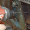 Bad Dog drill bit used to drill painted structural steel assembly