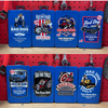 Collection of Bad Dog Tools custom art drill bit tins on pegboard