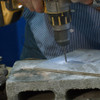 Drill Bit going through stone & concrete