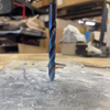 Cobalt drill bit cutting through thick aluminum plate