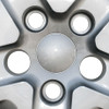 Close-up showing 5 lug nut holes in hubcap. Remove the 3 lug nuts on your car that line up with the 3 smaller holes on the hubcap, then press on the hubcap and torque down the 3 removed lug nuts  to factory specs locking the hubcap onto your wheel. Close-up showing 5 lug nut holes in hubcap. Remove the 3 lug nuts on your car that line up with the 3 smaller holes on the hubcap, then press on the hubcap and torque down the 3 removed lug nuts  to factory specs locking the hubcap onto your wheel.