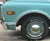 Close-up 1968 GMC Truck 910 Custom Cab with 6-Lug Wheels 15" Trim Rings and Baby Moon Truck Hubcaps IMP-11
