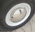 Close-up of Rear Long Axle Hub With Our Baby Moon Hubcap Wheel Cover Installed