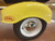 Close-up of our baby moons on the 12" wheel of vintage trailer