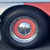 Close-up Baby Moons on a 1956 Pontiac Chieftain Catalina