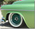 Brilliant Chrome Spyder Hubcap shown on a painted steel wheel with our Ribbed Trim Rings