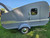 12 inch moon hub caps chromed solid steel wheel covers shown on a vintage teardrop camper (after).