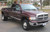 Polished Solid Stainless Steel Bolt-on Wheel Simulators on a Dodge Ram 3500 Truck.