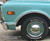 Close-up 1968 GMC Truck 910 Custom Cab with 6-Lug Wheels 15" Trim Rings and Baby Moon Truck Hubcaps