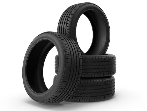 Isolated Aftermarket Tires on a white background