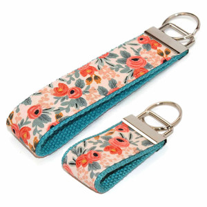 coral & mint floral keychain silver hardware in both wristlet and mini size coral & mint floral keychain silver hardware in both wristlet and mini size
