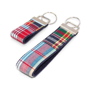 madras patchwork keychain silver hardware in both wristlet and mini size madras patchwork keychain silver hardware in both wristlet and mini size