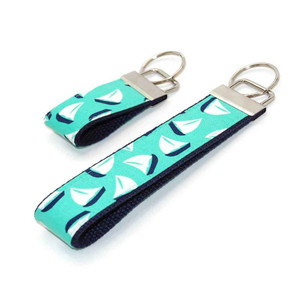 sailboat on mint keychain silver hardware in both wristlet and mini size sailboat on mint keychain silver hardware in both wristlet and mini size