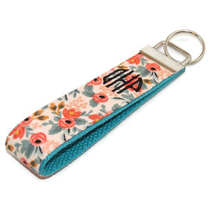 this is a picture of floral fabric keychain this is a picture of floral fabric keychain