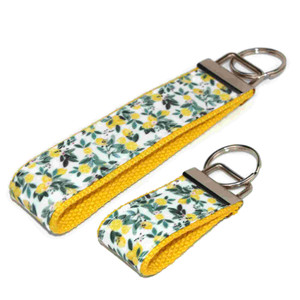 lemon floral keychain silver hardware in both wristlet and mini size lemon floral keychain silver hardware in both wristlet and mini size