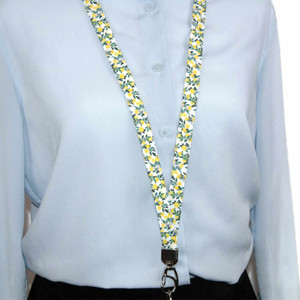 lemon floral fabric lanyard on mannequin facing forward lemon floral fabric lanyard on mannequin facing forward