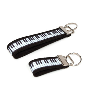 piano keychain silver hardware in both wristlet and mini size piano keychain silver hardware in both wristlet and mini size