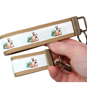 vintage geese keychain brass hardware in both wristlet and mini size vintage geese keychain brass hardware in both wristlet and mini size