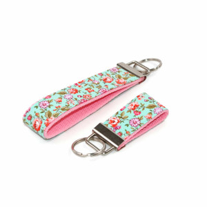 mint floral keychain silver hardware in both wristlet and mini size