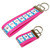 smiling teeth keychain in both the mini and wristlet size