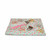 mint floral keychains grouped on top of the fabric