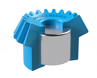 Overview of the overmolding process showing a magnet being fully encapsulated inside injection-molded plastic housing