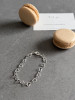 Sterling silver linked hearts bracelet.