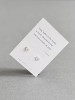 Sterling silver paw heart earrings on a Haiku poem message card.
