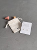 Sterling silver paw heart earrings on a Haiku poem message card. The earrings are shown with a Wue gift bag.
