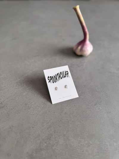 Sterling silver ghost earrings on a 'Spooktacular' message card. Sterling silver ghost earrings on a 'Spooktacular' message card.