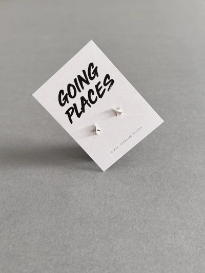 Sterling silver airplane earrings on a 'Going Places' message card. Sterling silver airplane earrings on a 'Going Places' message card.