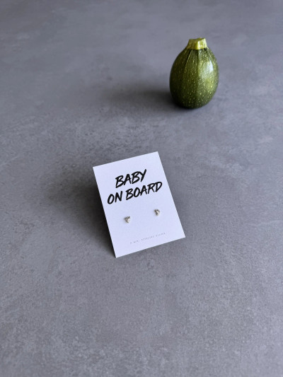 Sterling silver little feet earrings on 'Baby On Board' message card. Sterling silver little feet earrings on 'Baby On Board' message card.