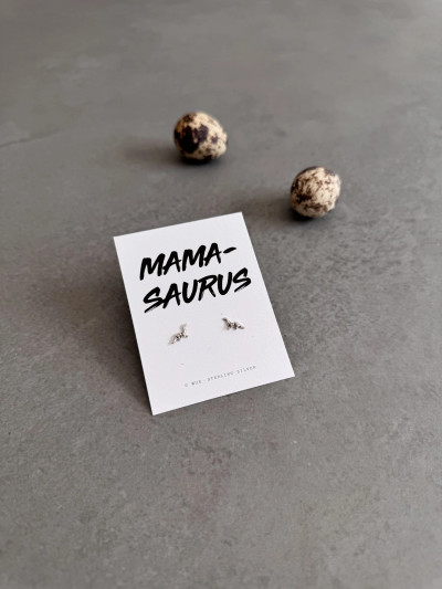 Sterling silver dinosaur earrings on a 'Mama-saurus' message card. Sterling silver dinosaur earrings on a 'Mama-saurus' message card.