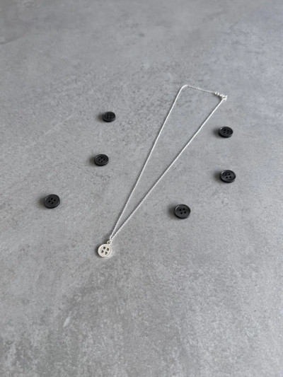 Sterling silver button necklace on a 'Thank You Mum' message card.