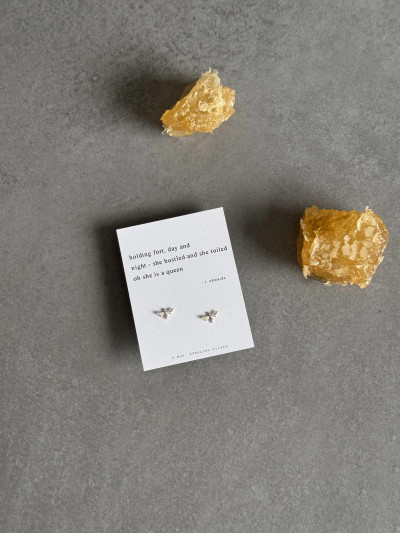 Sterling silver bee earring on a Haiku poem message card.