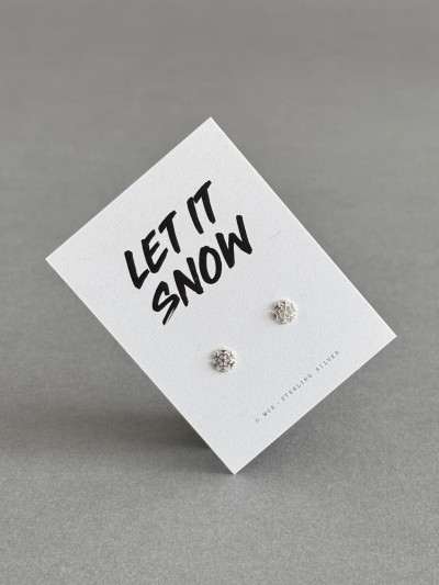 Sterling silver snowflake earrings on a 'Let It Snow' message card.