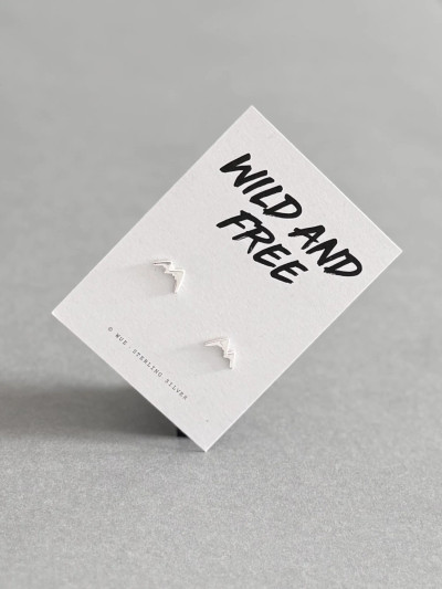 Sterling silver mountain earrings on a 'Wild And Free' message card.