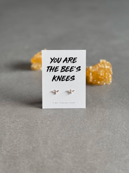 Sterling Silver Bee Earrings On A "You Are The Bee's Knees" Message card. The earrings are shown with Honeycomb in the background.
