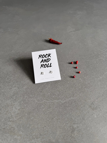 Sterling silver music note earrings on a 'Rock & Roll' message card.