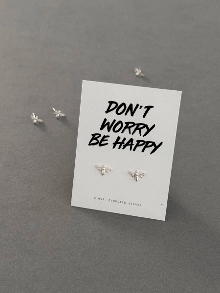 Sterling silver bee earrings on a 'Be Happy' message card. The earrings are also shown loose behind the message card.