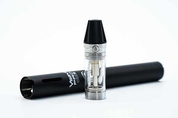 Vsavi Pro Series 3 battery laid flat with the Vsavi Pro Series 3 cartridge standing in front on a white background. Vsavi Pro Series 3 device and cartridge