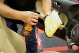1. Vacuum to remove loose dirt and debris. Spray Leather Cleaner & Conditioner directly onto a soft microfiber towel.