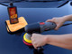 Or with a dual action polisher equipped with a soft foam finishing pad..