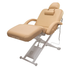 Tilted tan beige Electric Lift Salon & Spa Table from an angle