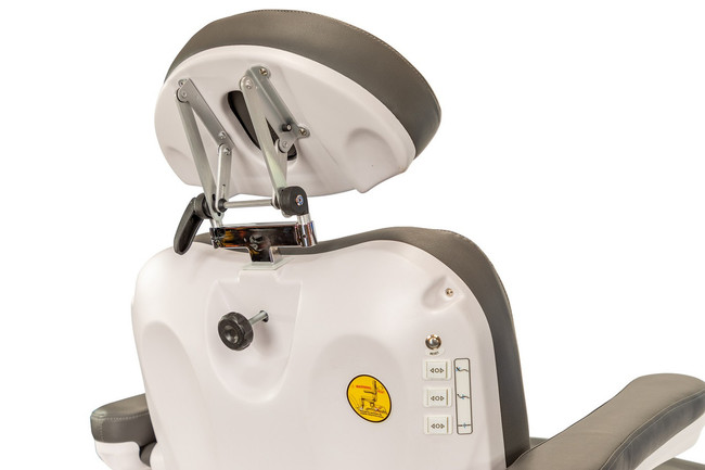 Detail of gray face cradle facepad and adjustment on the underside of the Medical Spa 2246B All Electric Medi Spa Exam Chair.