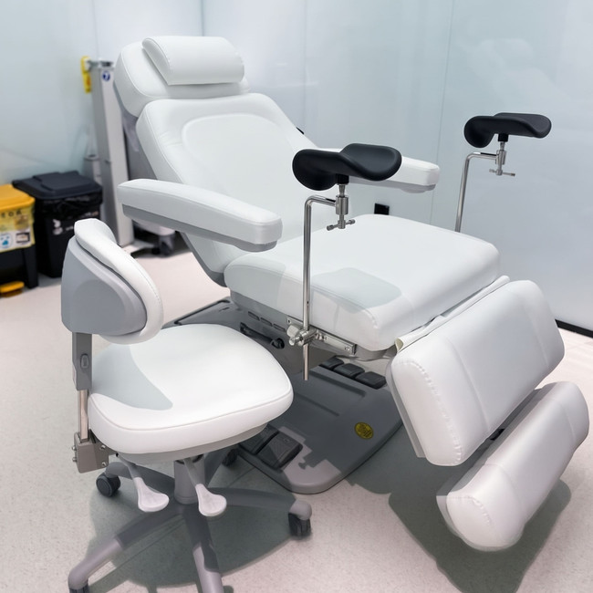 Lifestyle real setting image of the 2246EBNS Medical Exam Chair Gynecological version With rails and stirrups
