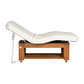 Side profile of Avanora electric treatment table in lowered position with reclined backrest