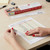 c-line-64112-self-adhesive-reinforcing-strips-in-use-with-box