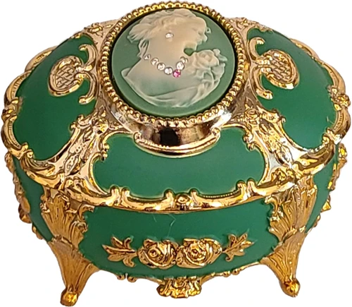 Splendid Cameo Oval Shaped Musical Jewelry Box