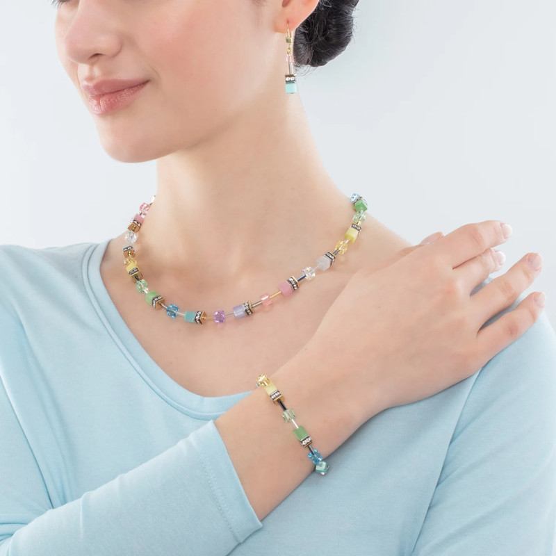 woman wearing a Coeur de Lion necklace and bracelet